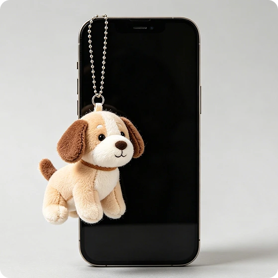 The Pup AI plush phone charm